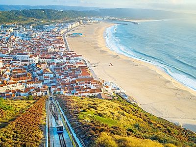 Upgrade to Lisbon by Private Transfer with Stops in Nazare and Obidos